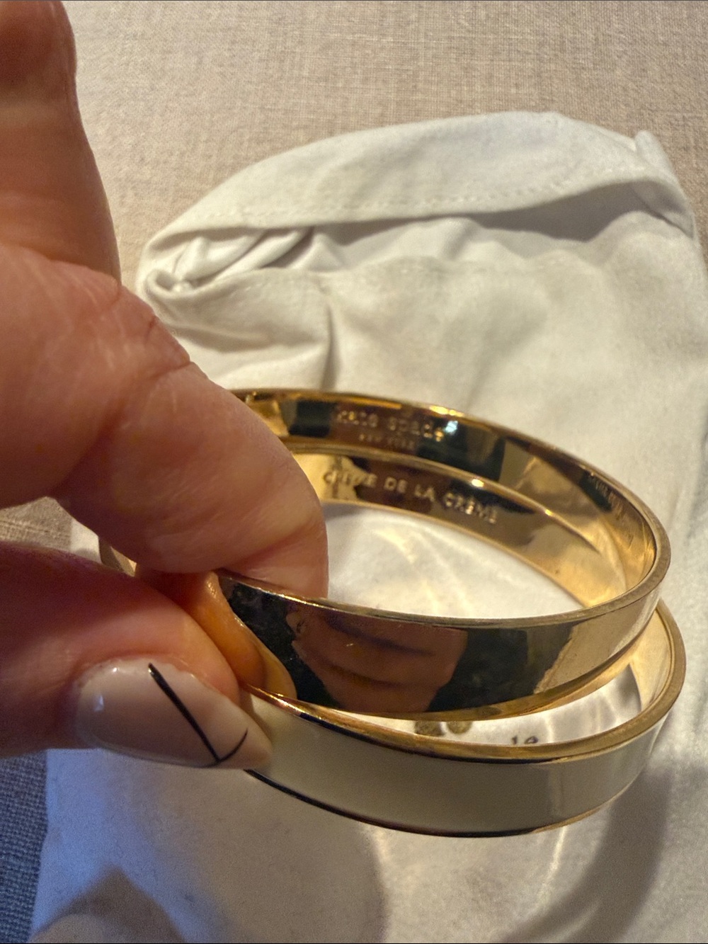 kate spade Gold and Cream Enamel Bangle set